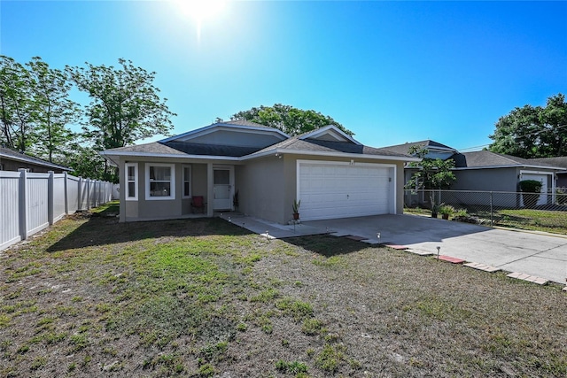 single story home with stucco siding, fence, a front lawn, a garage, and driveway
