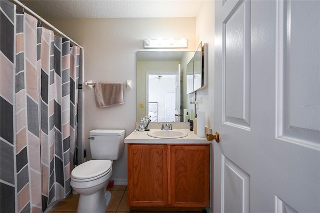 full bathroom featuring tile patterned floors, vanity, a shower with curtain, and toilet