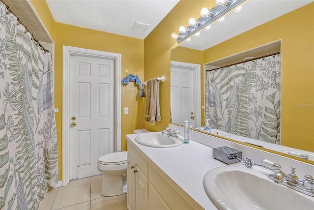 7655 Persian Ct, Orlando, FL 32819 - full bath featuring double vanity, tile patterned flooring, toilet, and a sink