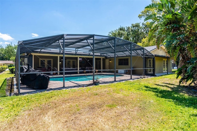 7655 Persian Ct, Orlando, FL 32819 - rear view of house featuring an outdoor pool, a yard, and a patio