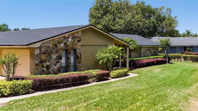 7655 Persian Ct, Orlando, FL 32819 - view of front of house with a garage, stone siding, and a front yard