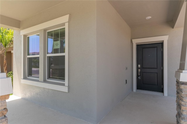 1908 Blissful Dr, Kissimmee, FL 34744 - doorway to property with stucco siding
