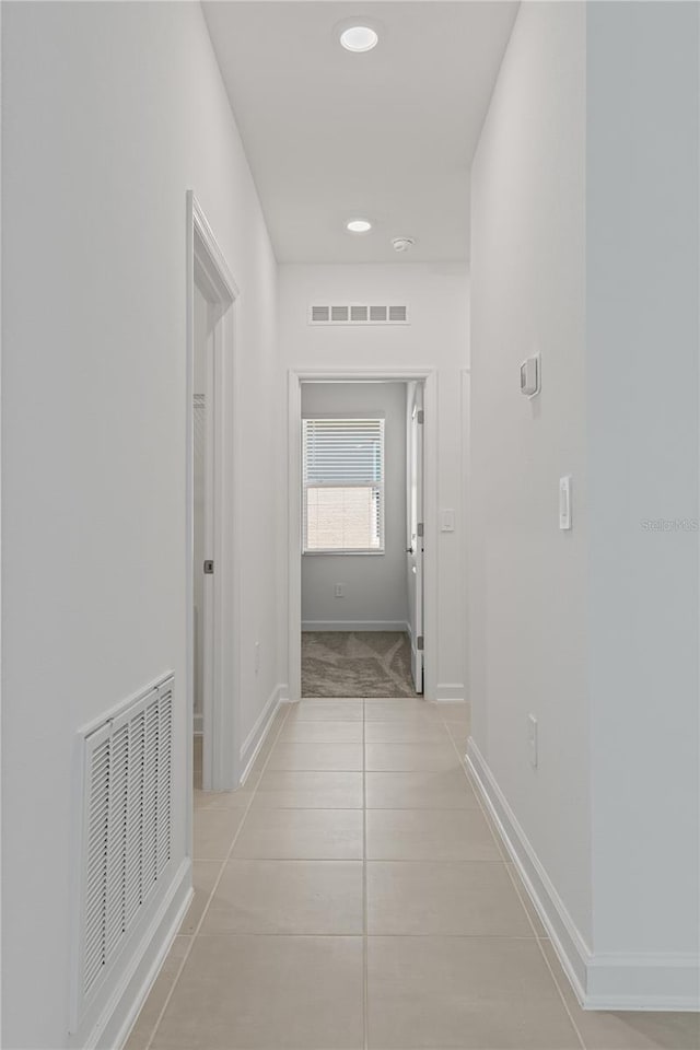 1908 Blissful Dr, Kissimmee, FL 34744 - corridor featuring visible vents, baseboards, recessed lighting, and light tile patterned floors