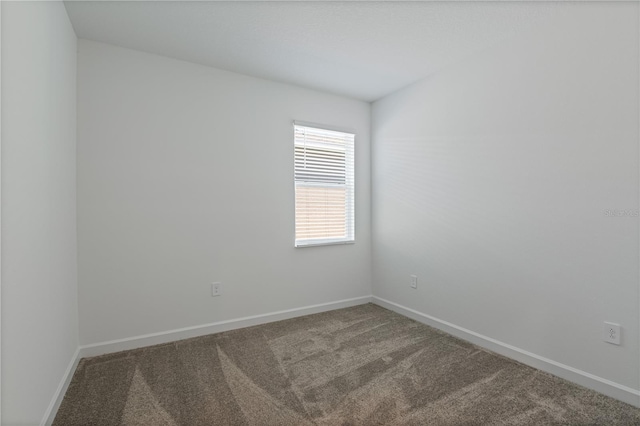 1908 Blissful Dr, Kissimmee, FL 34744 - carpeted spare room with baseboards
