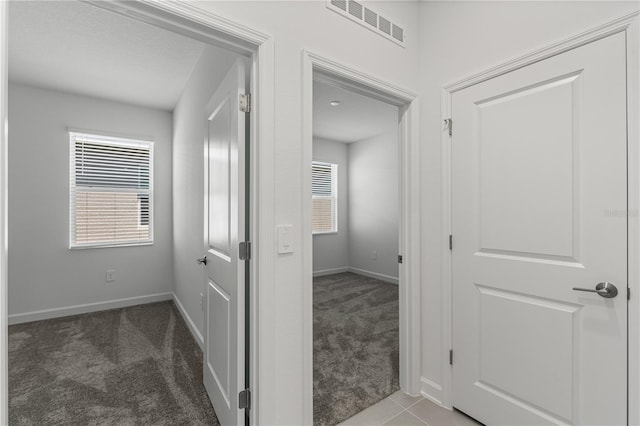1908 Blissful Dr, Kissimmee, FL 34744 - corridor with carpet flooring, visible vents, and baseboards