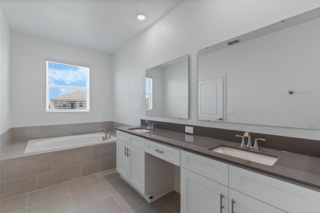 1908 Blissful Dr, Kissimmee, FL 34744 - full bath with a bath, tile patterned floors, a sink, and visible vents