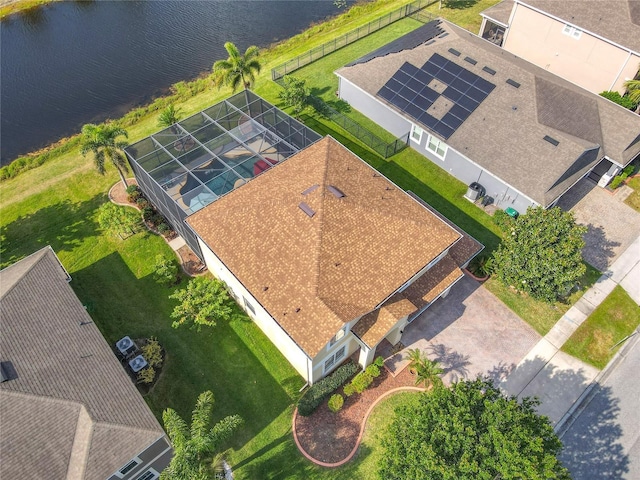 drone / aerial view with a water view