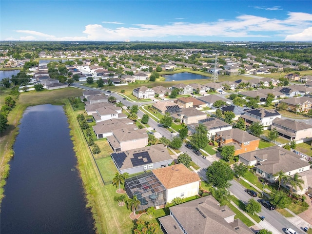 aerial view with a residential view and a water view
