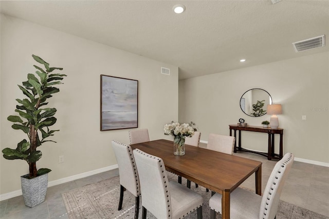 3259 Buoy Cir, Winter Garden, FL 34787 - tiled dining room with baseboards, visible vents, and recessed lighting