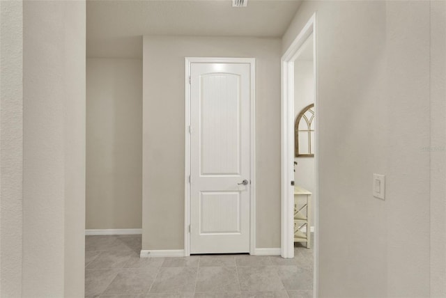 3259 Buoy Cir, Winter Garden, FL 34787 - corridor featuring baseboards and light tile patterned flooring