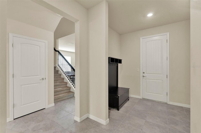 3259 Buoy Cir, Winter Garden, FL 34787 - hallway featuring recessed lighting, stairway, baseboards, and light tile patterned floors