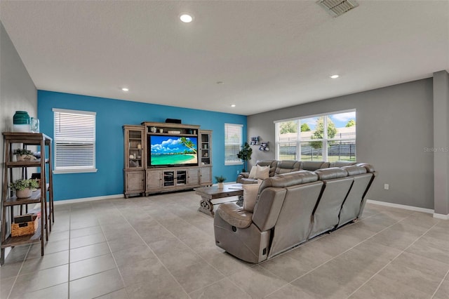 3259 Buoy Cir, Winter Garden, FL 34787 - living area with visible vents, baseboards, recessed lighting, and light tile patterned floors