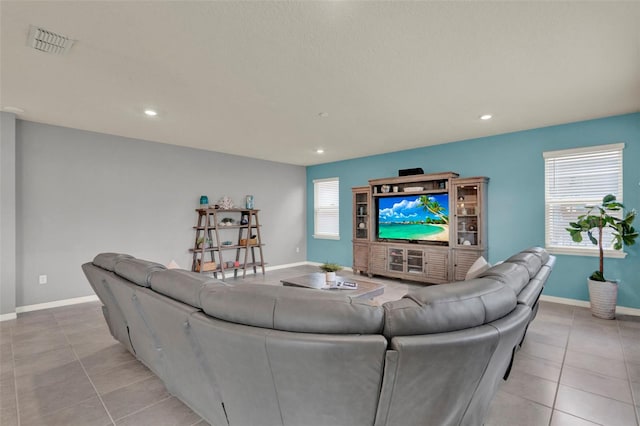 3259 Buoy Cir, Winter Garden, FL 34787 - living room featuring light tile patterned floors, baseboards, recessed lighting, and visible vents