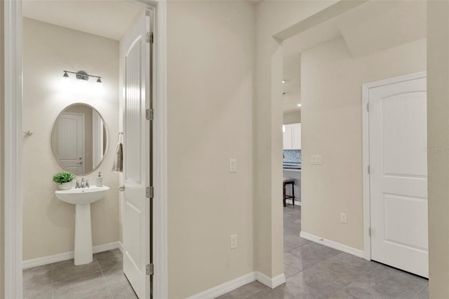 3259 Buoy Cir, Winter Garden, FL 34787 - hallway with light tile patterned floors and baseboards