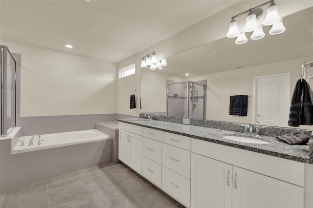 3259 Buoy Cir, Winter Garden, FL 34787 - full bath with a shower stall, double vanity, a garden tub, and a sink