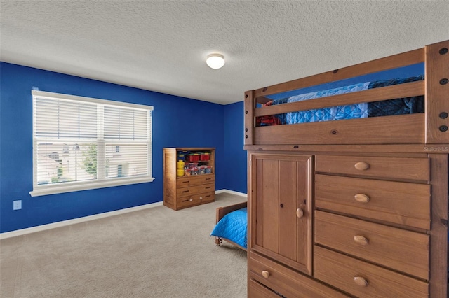 3259 Buoy Cir, Winter Garden, FL 34787 - bedroom with a textured ceiling, baseboards, and carpet floors