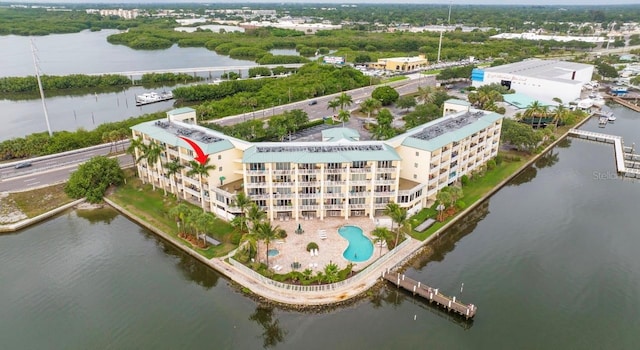 8800 Bay Pines Blvd Unit 306, Saint Petersburg, FL 33709 - drone / aerial view featuring a water view