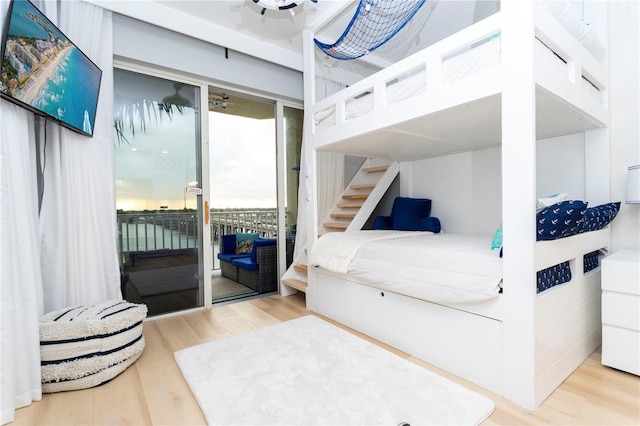 8800 Bay Pines Blvd Unit 306, Saint Petersburg, FL 33709 - bedroom with wood finished floors and access to outside
