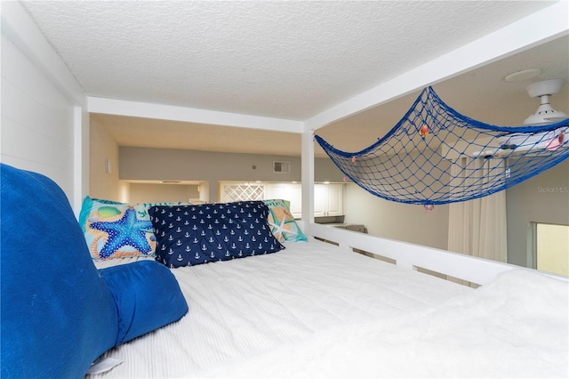8800 Bay Pines Blvd Unit 306, Saint Petersburg, FL 33709 - bedroom with a textured ceiling and visible vents