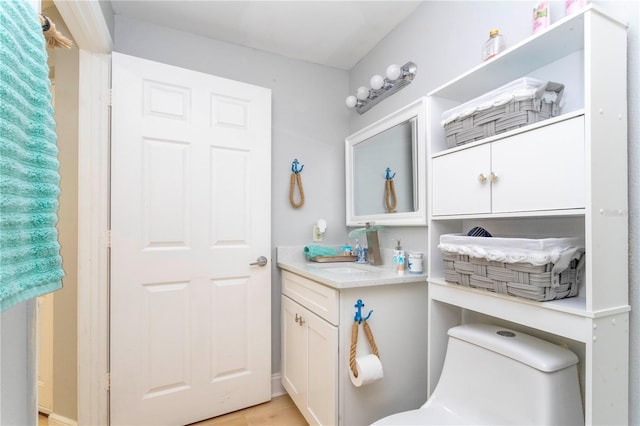 8800 Bay Pines Blvd Unit 306, Saint Petersburg, FL 33709 - bathroom featuring toilet and vanity
