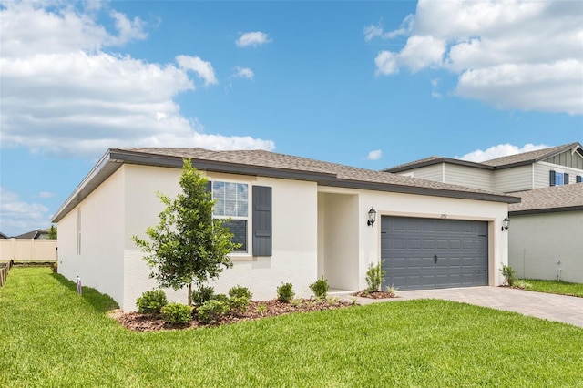 1752 Brekey Way, Zephyrhills, FL 33541 - view of front of house with a garage, driveway, and stucco siding