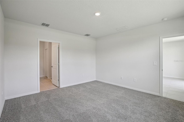 1839 Brekey Way, Zephyrhills, FL 33541 - carpeted spare room featuring baseboards and recessed lighting