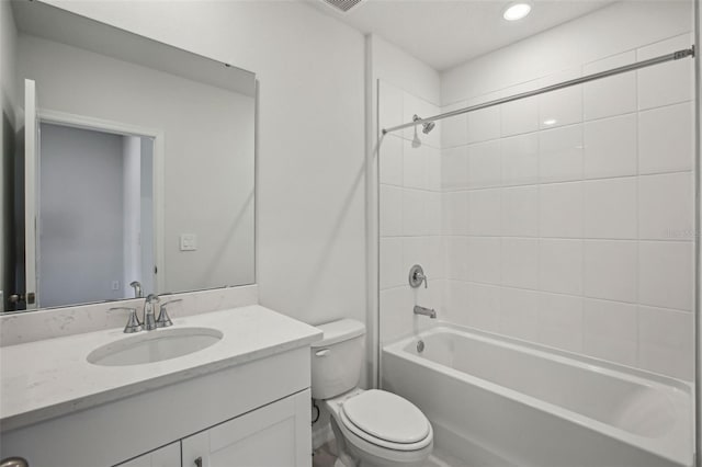 1839 Brekey Way, Zephyrhills, FL 33541 - full bath featuring toilet, vanity, shower / washtub combination, and recessed lighting