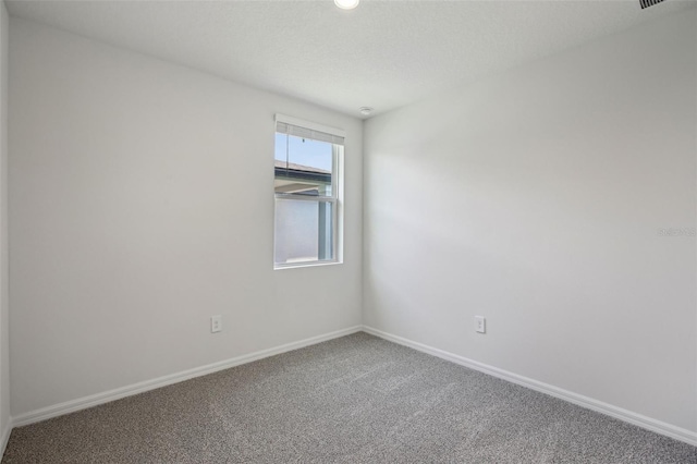 1839 Brekey Way, Zephyrhills, FL 33541 - empty room with carpet floors and baseboards