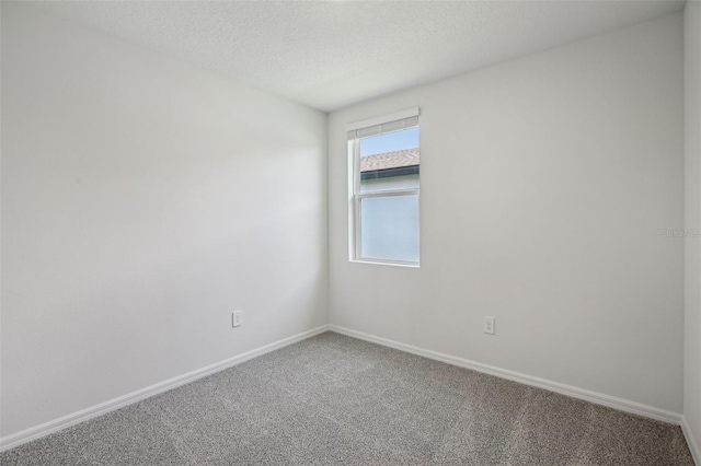 1839 Brekey Way, Zephyrhills, FL 33541 - carpeted empty room with baseboards and a textured ceiling
