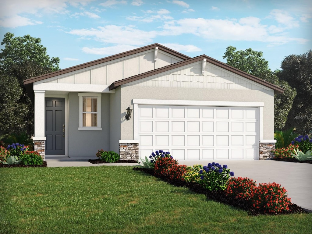 ranch-style home with driveway, stone siding, an attached garage, a front yard, and stucco siding
