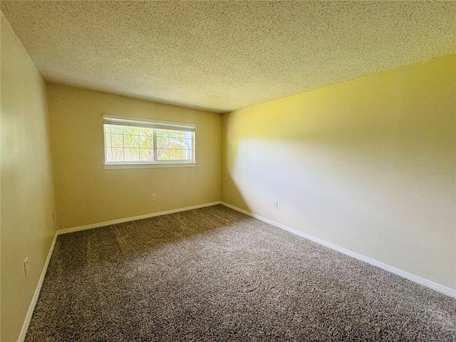 1695 Lee Rd Unit E214, Winter Park, FL 32789 - carpeted empty room featuring a textured ceiling and baseboards