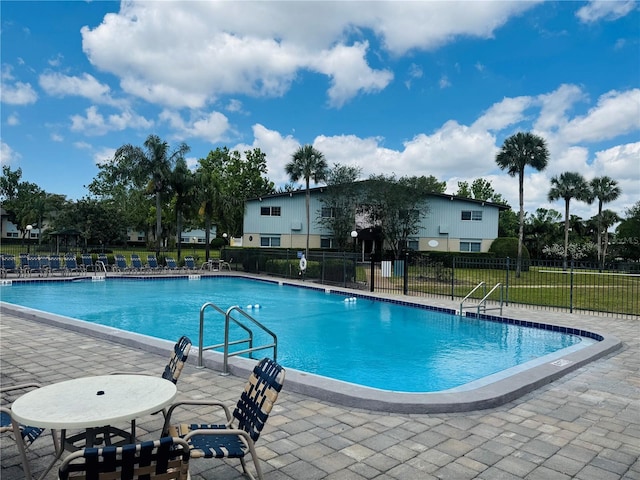 1695 Lee Rd Unit E214, Winter Park, FL 32789 - community pool with a patio area