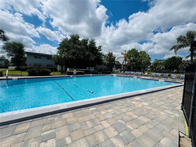 1695 Lee Rd Unit E214, Winter Park, FL 32789 - community pool with a patio
