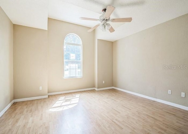2503 SE 18th Cir, Ocala, FL 34471 - spare room with baseboards, a ceiling fan, and wood finished floors