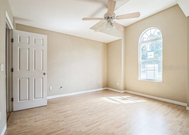 2503 SE 18th Cir, Ocala, FL 34471 - spare room with baseboards, a ceiling fan, and light wood-style floors