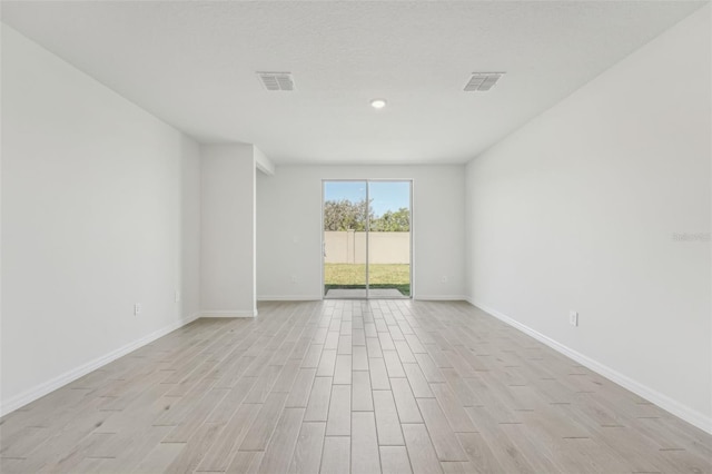 1861 Brekey Way, Zephyrhills, FL 33541 - unfurnished room featuring light wood finished floors and baseboards
