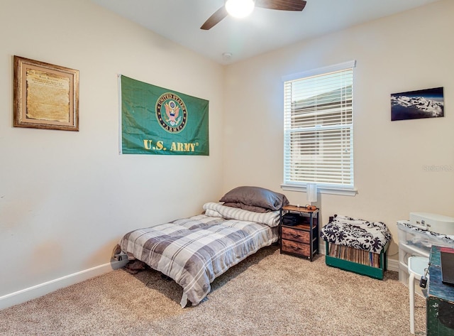 2331 Kennington Cv, Deland, FL 32724 - carpeted bedroom with baseboards and a ceiling fan