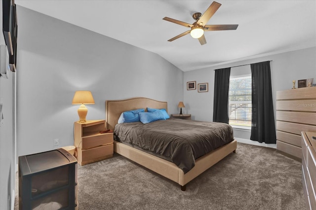 carpeted bedroom featuring ceiling fan and vaulted ceiling