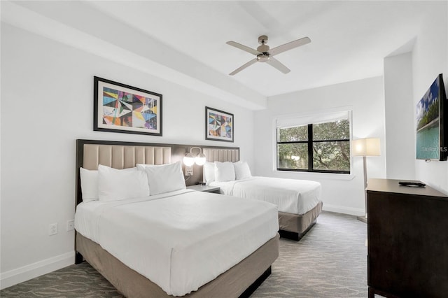 bedroom featuring ceiling fan and baseboards