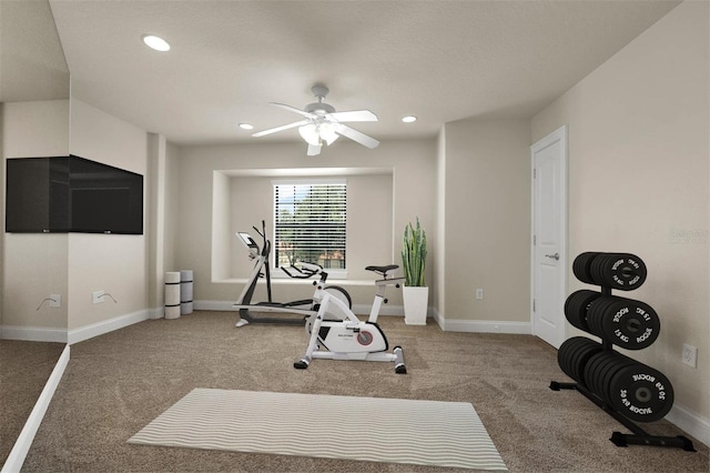 exercise room featuring recessed lighting, baseboards, a ceiling fan, and carpet floors