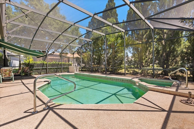 24104 Peekskill St, Leesburg, FL 34748 - view of swimming pool with a patio, a pool with connected hot tub, and a lanai