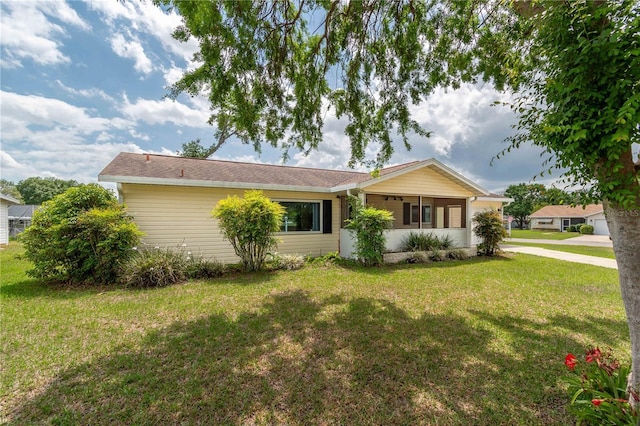 6366 SW 115th Street Rd, Ocala, FL 34476 - ranch-style home featuring a front yard and driveway