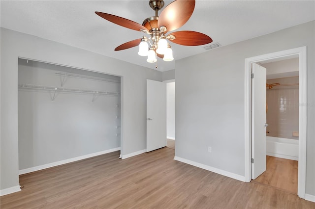 6366 SW 115th Street Rd, Ocala, FL 34476 - unfurnished bedroom featuring light wood-style floors, connected bathroom, a closet, visible vents, and baseboards