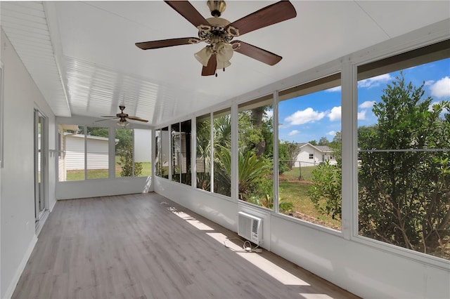 6366 SW 115th Street Rd, Ocala, FL 34476 - unfurnished sunroom with a wall mounted AC and a ceiling fan
