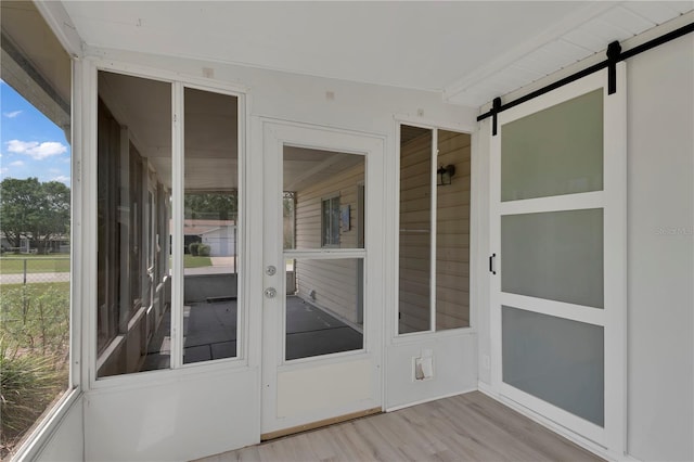 6366 SW 115th Street Rd, Ocala, FL 34476 - unfurnished sunroom featuring a barn door