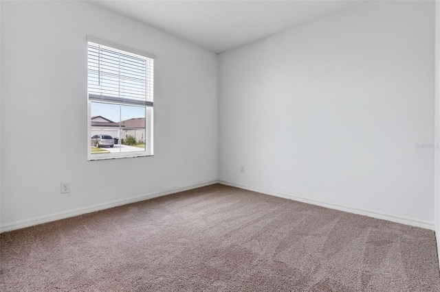 10008 Last Light Gln, Parrish, FL 34219 - empty room with baseboards and carpet