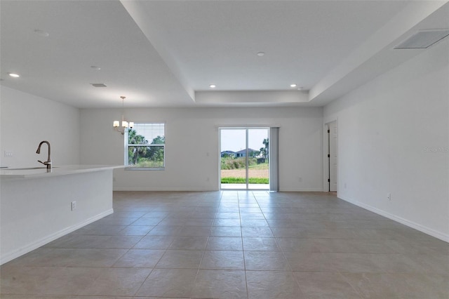 10008 Last Light Gln, Parrish, FL 34219 - spare room featuring an inviting chandelier, recessed lighting, light tile patterned flooring, and visible vents