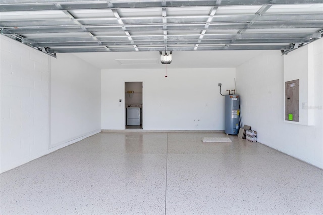 10008 Last Light Gln, Parrish, FL 34219 - garage featuring separate washer and dryer, a garage door opener, water heater, and electric panel