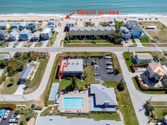 865 Ladyfish Ave Unit C104, New Smyrna Beach, FL 32169 - drone / aerial view with a view of the beach and a water view