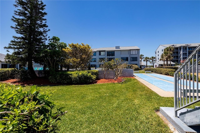 865 Ladyfish Ave Unit C104, New Smyrna Beach, FL 32169 - view of yard with shuffleboard